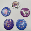 Five large 58mm disability and chronic illness themed button badges from Glitchy But Cute