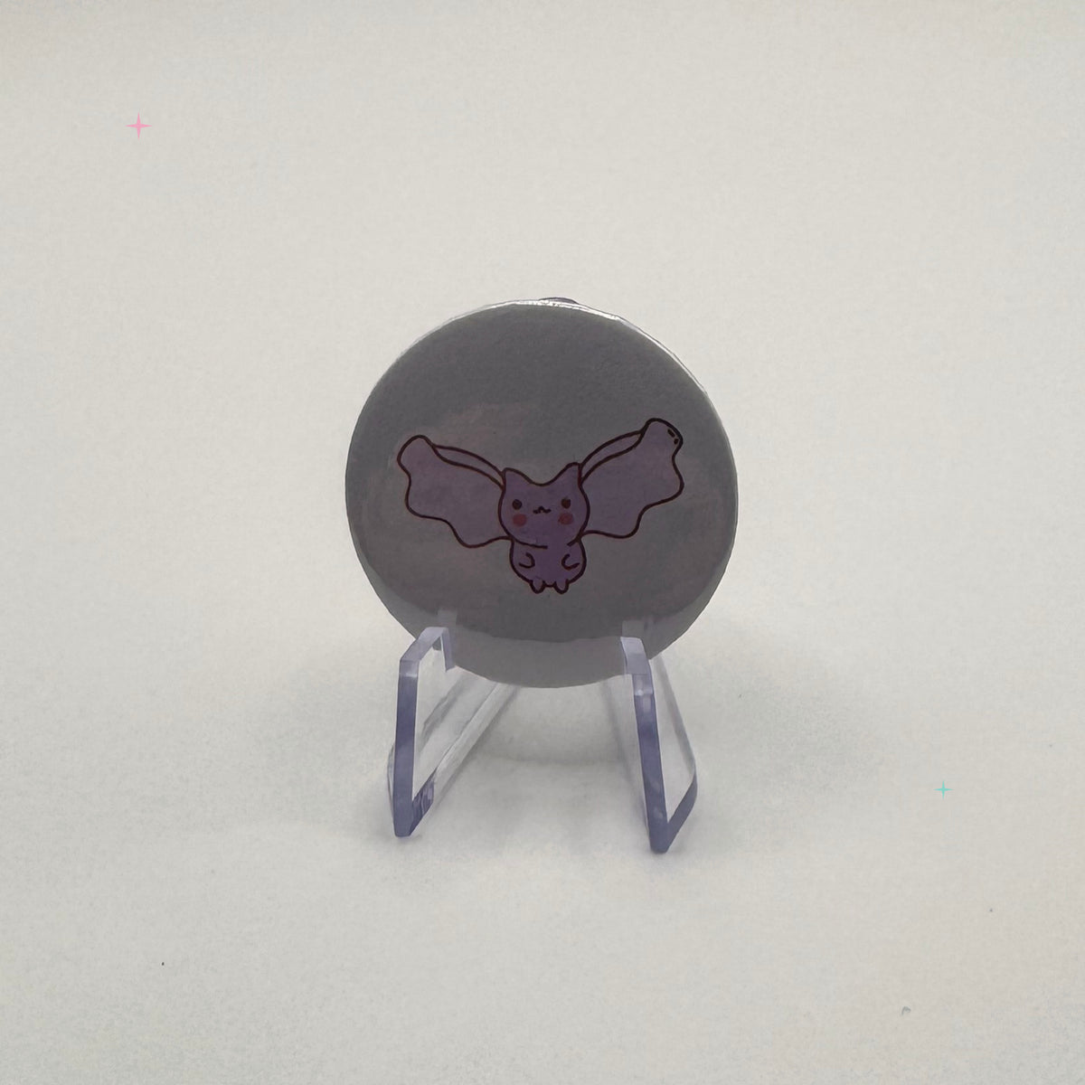 32mm pastel bat badge on a white background