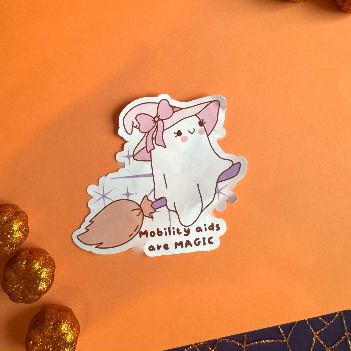 Mobility Aids are Magic die-cut sticker on an orange autumn background