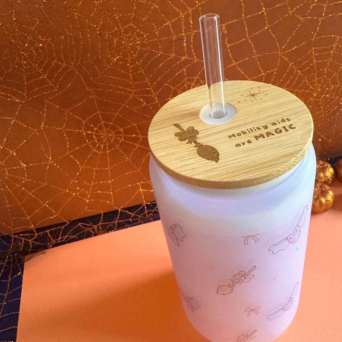 Engraved bamboo tumbler lid styled with autumn props