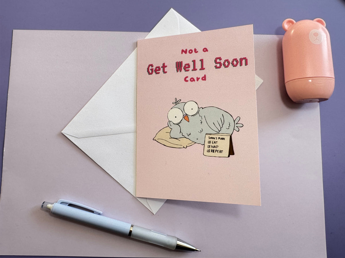 Not a Get Well Soon Card displayed in a styled lifestyle photograph.