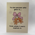To the Person Who Gets It A6 Christmas card with an illustration of two gingerbread characters.