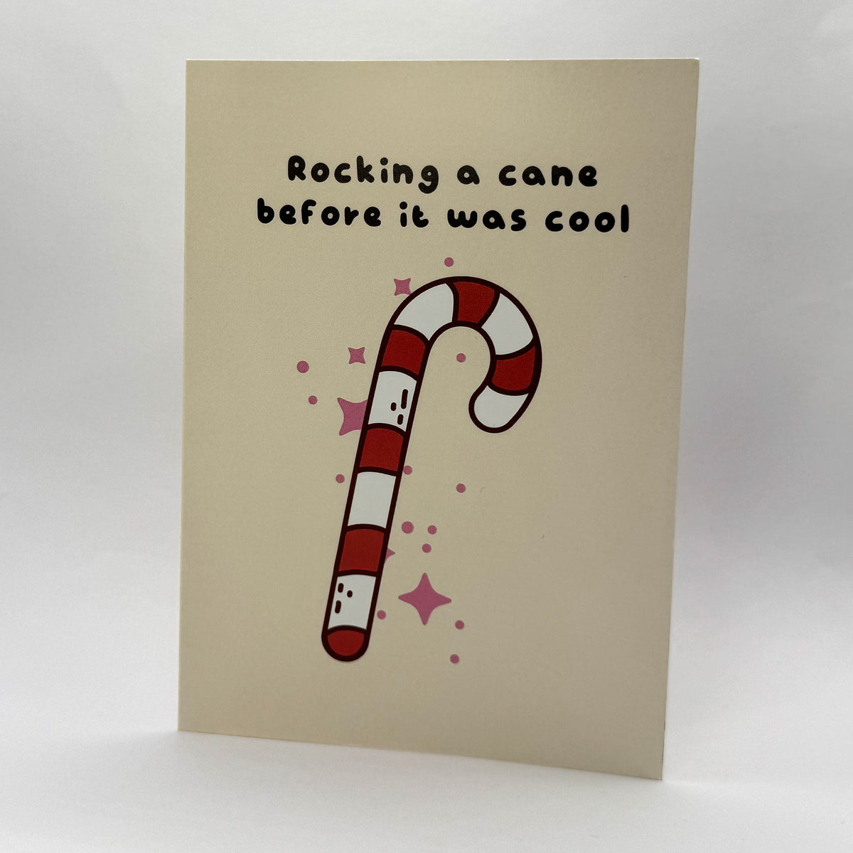 Rocking a Cane Before It Was Cool A6 Christmas card featuring a festive candy cane design.