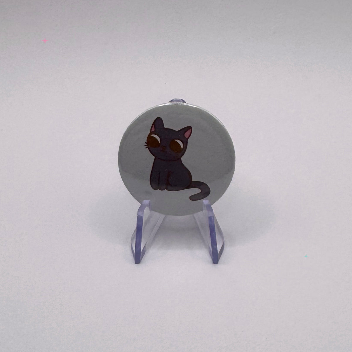 Hexecutive Dysfunction black cat 32mm badge on white background