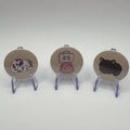 Hibernation Is a Reasonable Adjustment three 32mm badge set on white background