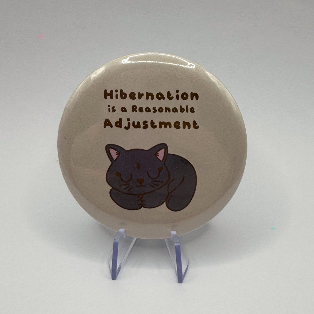 Hibernation Is a Reasonable Adjustment Black Cat 58mm badge on white background