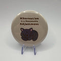 Hibernation Is a Reasonable Adjustment Black Cat 58mm badge on white background