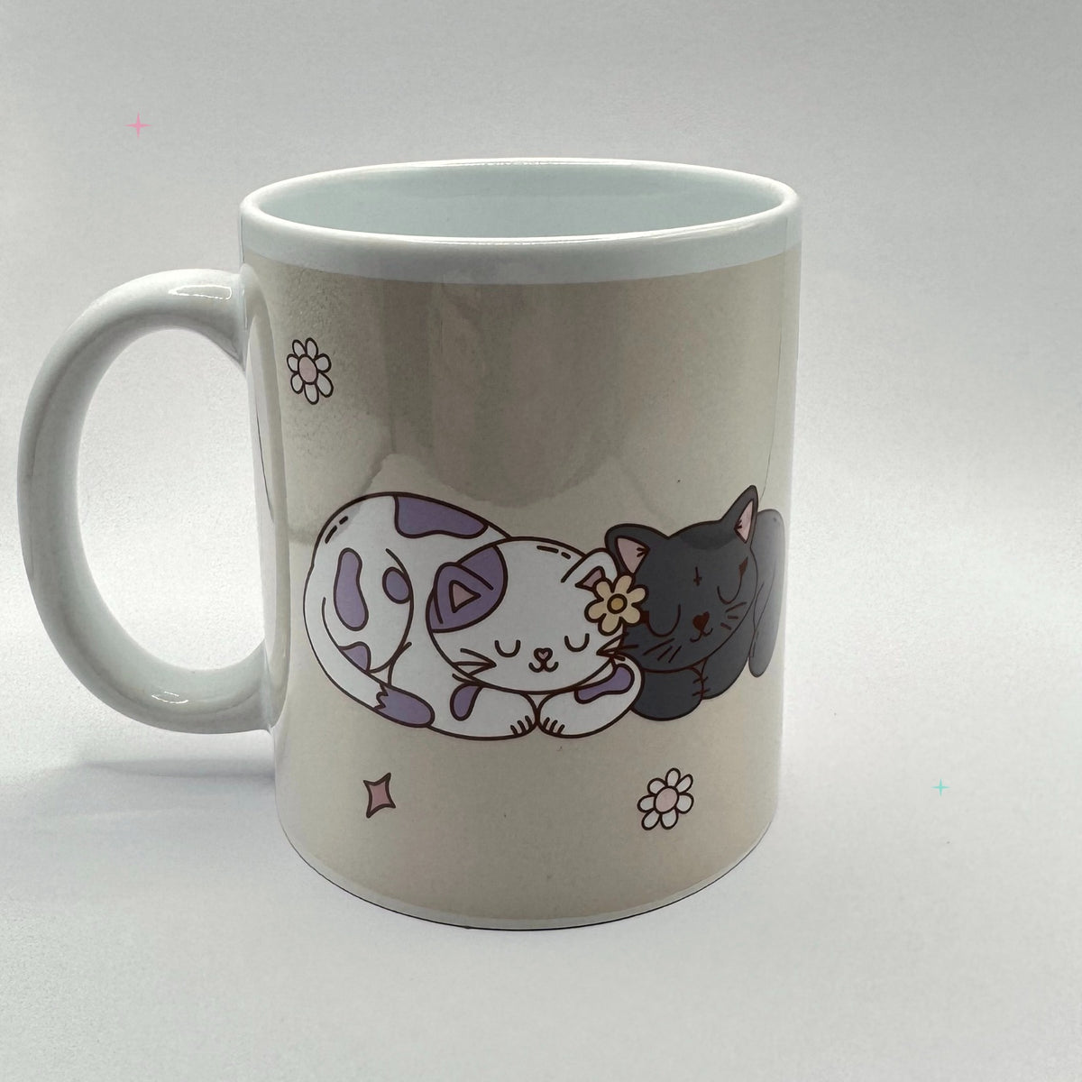 Hibernation Is a Reasonable Adjustment 11oz mug sleeping cats side on white background