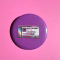 58mm purple Patch the World, Not Me button badge on a pink background