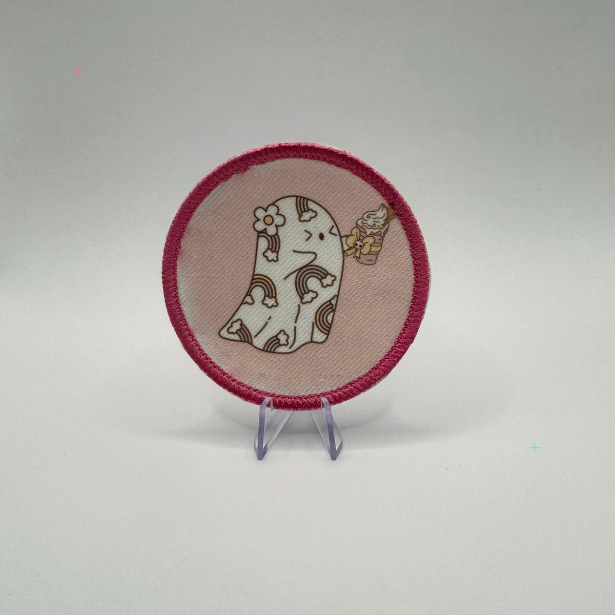 Round Pumpkin Spice and Symptom Spikes ghost patch on a white background