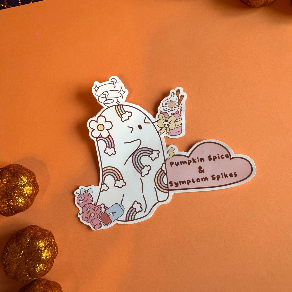 Pumpkin Spice and Symptom Spikes die-cut sticker on an orange autumn background