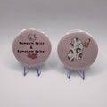 Pumpkin Spice & Symptom Spikes – 2 × 58mm Badge Set