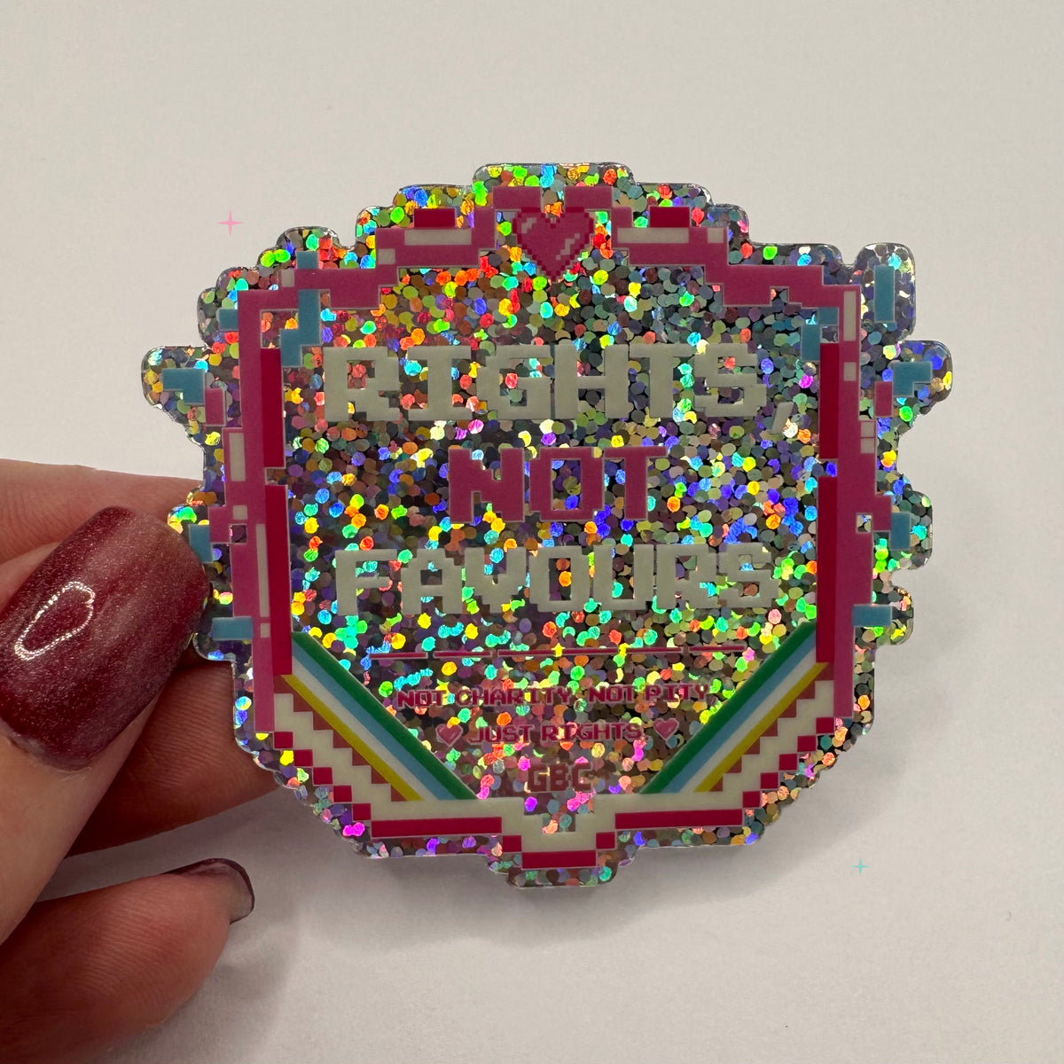 Rights Not Favours holographic disability rights sticker