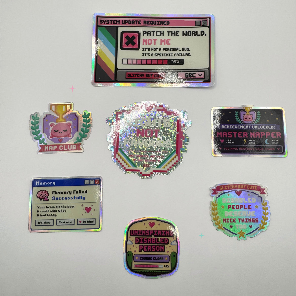 Seven assorted holographic disability and chronic illness stickers