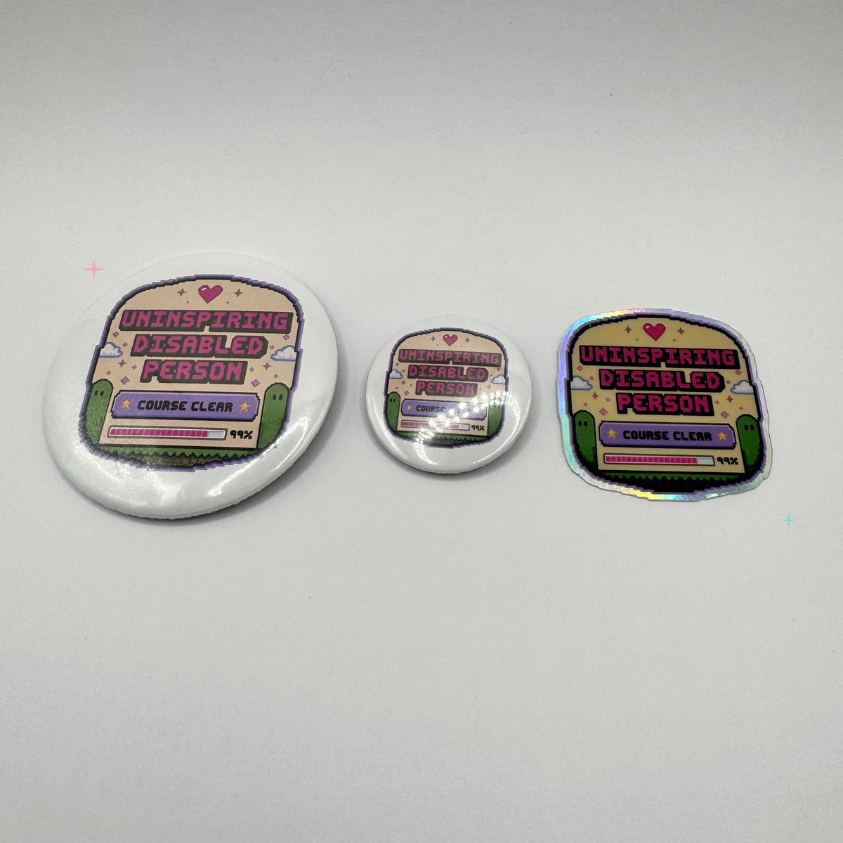 Uninspiring Disabled Person bundle with 58mm badge, 32mm badge and holographic sticker
